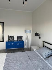 Posteľ alebo postele v izbe v ubytovaní Apartament Dziewiątka