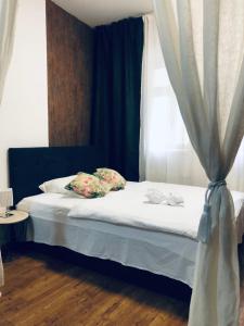 Postel nebo postele na pokoji v ubytování Luxury Apartments Zelny Trh 11