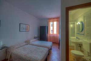 Cama o camas de una habitación en Sogni D'Oro Guest House
