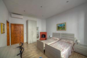 Cama o camas de una habitación en Sogni D'Oro Guest House