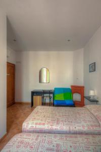 Cama o camas de una habitación en Sogni D'Oro Guest House