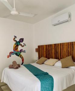 Postel nebo postele na pokoji v ubytování Mis Sueños Holbox