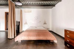 Posteľ alebo postele v izbe v ubytovaní Tavola tonda apartament
