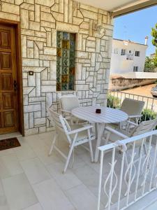 Balkón nebo terasa v ubytování Aegean Breeze Beach House