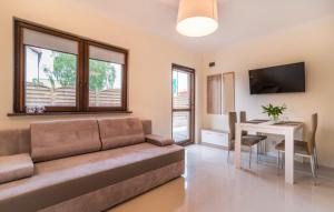 Fotografie z fotogalerie ubytování Gray House Apartamenty Dziwnówek v destinaci Dziwnówek + 13 fotografií