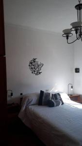 Ένα ή περισσότερα κρεβάτια σε δωμάτιο στο La casa del abuelo