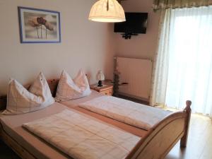 Krevet ili kreveti u jedinici u okviru objekta Ferienwohnung Wachmann