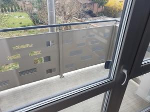 a view from a window of a balcony at Good Time Apartaments Sienkiewicza in Leszno +15 photos