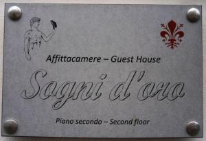 Certificado, premio, señal o documento que está expuesto en Sogni D'Oro Guest House