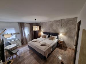 מיטה או מיטות בחדר ב-Hotel Zur Post