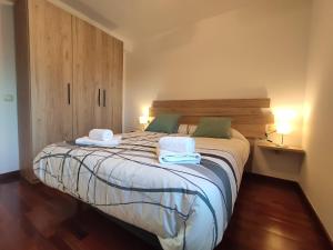 A bed or beds in a room at Allotjaments Paratge Fabas