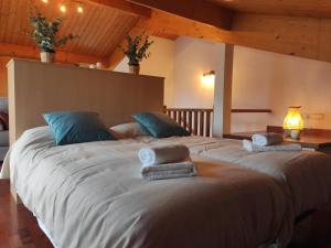 A bed or beds in a room at Allotjaments Paratge Fabas