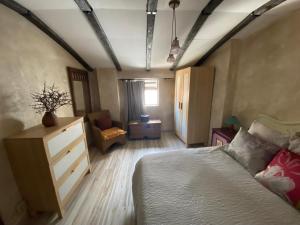 Postel nebo postele na pokoji v ubytování La Casa de Sara