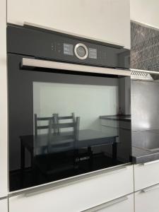 Kuchyň nebo kuchyňský kout v ubytování Apartment 13