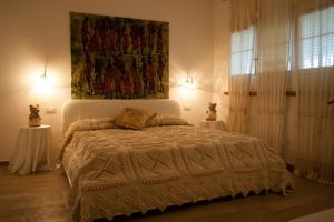 Postel nebo postele na pokoji v ubytování Anthos Casa Vacanze