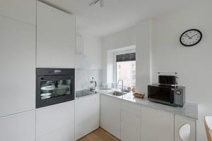 Kuchyňa alebo kuchynka v ubytovaní Luxurious 3BR APT Center