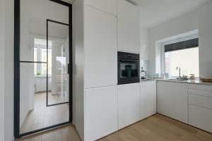 Kuchyňa alebo kuchynka v ubytovaní Luxurious 3BR APT Center
