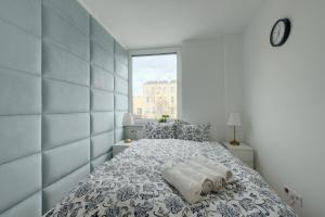 Posteľ alebo postele v izbe v ubytovaní Luxurious 3BR APT Center