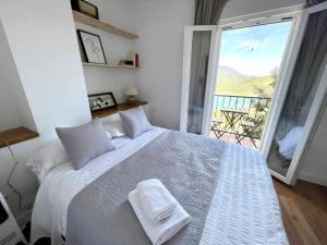 Postel nebo postele na pokoji v ubytování La Buganvilla