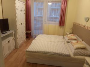 Posteľ alebo postele v izbe v ubytovaní Bötös Villa Haus + 15 fotografií
