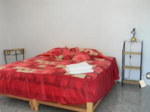 מיטה או מיטות בחדר ב-Hotel Lienzo Charro II