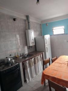 Virtuvė arba virtuvėlė apgyvendinimo įstaigoje Lo de Margarita