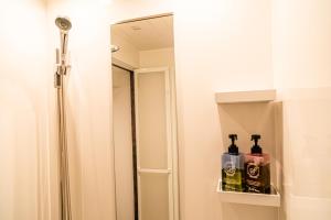 Koupelna v ubytování OKI's Inn