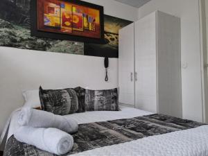 Posteľ alebo postele v izbe v ubytovaní Hotel Casa Loma
