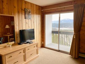 A television and/or entertainment centre at Rocky Mountain Springs Lodge