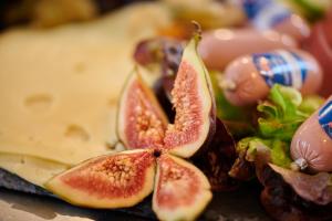 a close up of a cut up fig at MY HOME Hotel Lamm Rottweil "Smart Home" in Rottweil