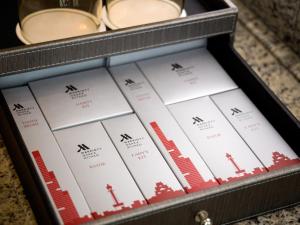 a box filled with wine bottles and plates at Osaka Marriott Miyako Hotel in Osaka