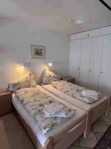Ліжко або ліжка в номері Valère Apartments