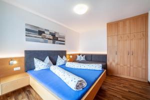 Posteľ alebo postele v izbe v ubytovaní Haus Hohenrain Ferienwohnung 2