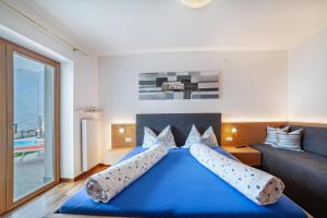 Posteľ alebo postele v izbe v ubytovaní Haus Hohenrain Ferienwohnung 2 + 20 fotografií