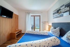 Posteľ alebo postele v izbe v ubytovaní Haus Hohenrain Ferienwohnung 2