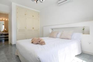 Posteľ alebo postele v izbe v ubytovaní Villa Princesa Faina