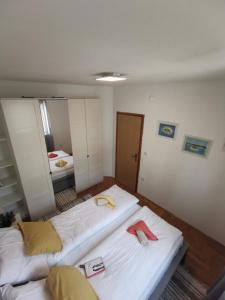 Łóżko lub łóżka w pokoju w obiekcie Apartment Zoanda