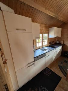 Kuchyň nebo kuchyňský kout v ubytování Haus Elsbeere