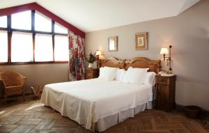 Postel nebo postele na pokoji v ubytování Hotel Katxi