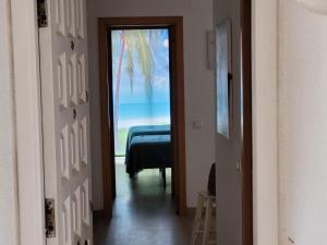 Posteľ alebo postele v izbe v ubytovaní Apartamentos CH