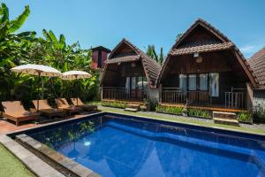 an image of a villa with a swimming pool at Loka Loka Ubud in Gianyar