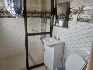 Vonios kambarys apgyvendinimo įstaigoje Impovu Guest House