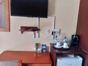 Kuchyň nebo kuchyňský kout v ubytování Impovu Guest House