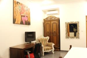 TV a/nebo společenská místnost v ubytování Ayu Guest House