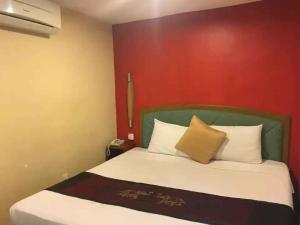 Postel nebo postele na pokoji v ubytování Hotel Nana's Inn