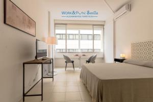 A television and/or entertainment centre at Apartamento Martin Villa