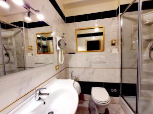 Koupelna v ubytování Hotel Continentale