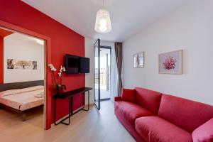 A television and/or entertainment centre at Aregai Marina Exclusive Seaside Apartments