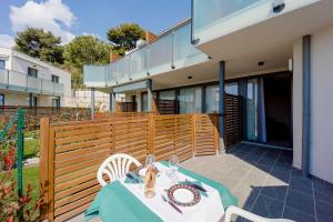 A balcony or terrace at Aregai Marina Exclusive Seaside Apartments