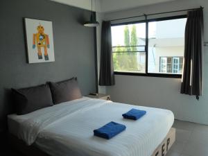 Postel nebo postele na pokoji v ubytování Sleep Guesthouse